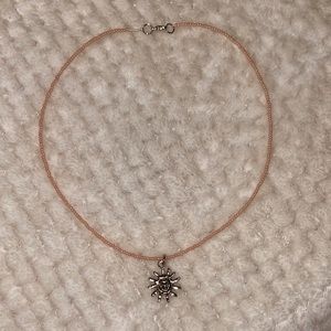 Peach hand- made beaded necklace with sun charm
